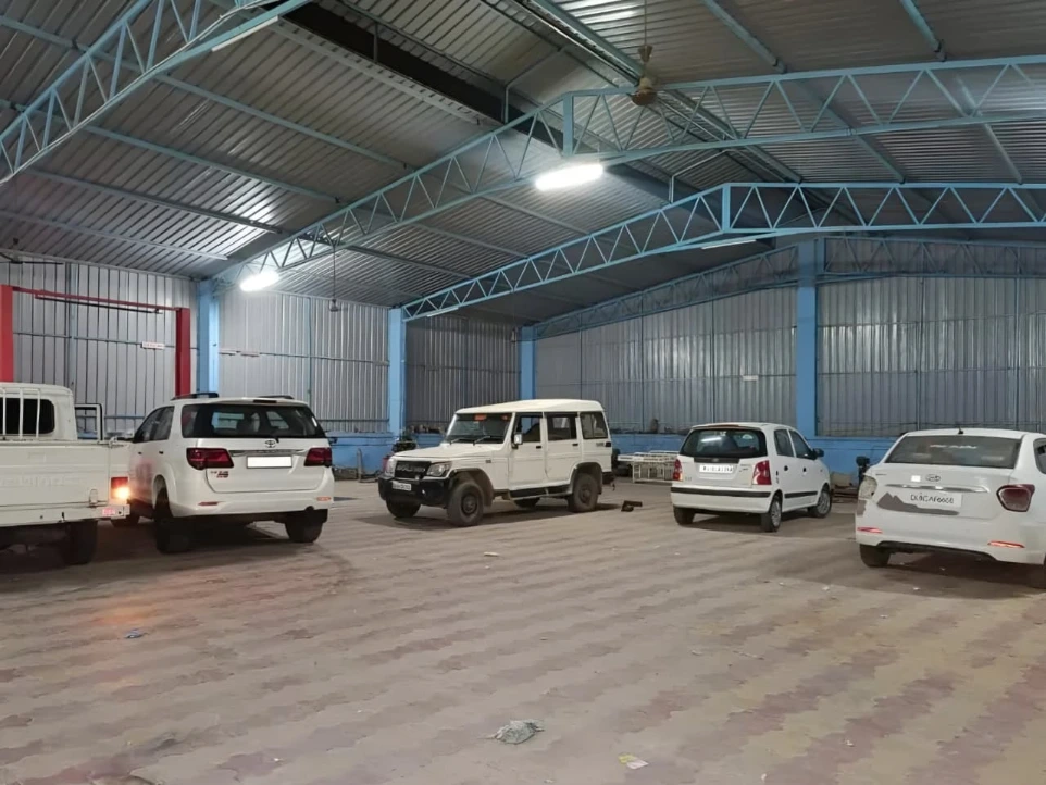 Car servicing in progress at Hari Kripa Services Salasar auto workshop