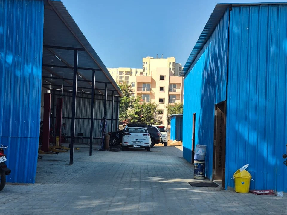 Hari Kripa Services car workshop building in Suncity Sikar Road Jaipur